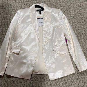 Shiny white blazer